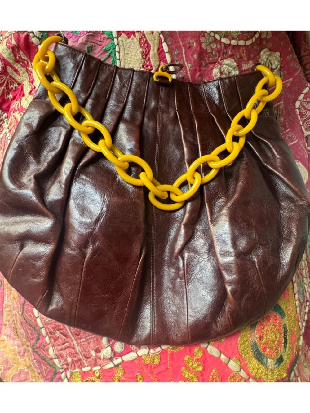 Wine-colored Donna Karan leather bag with bakelite strap